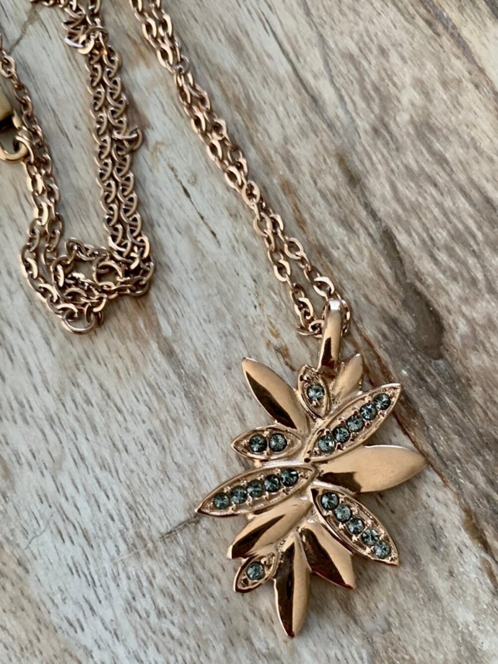 Dyrberg/Kern Nelumba rose gold flower necklace with grey Swarovski crystals